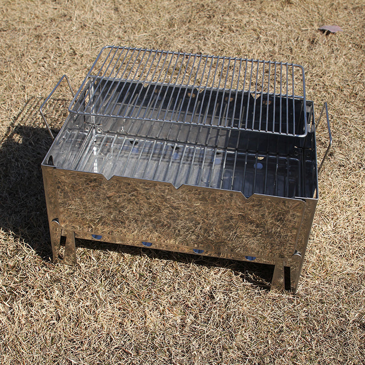 Outdoor portable charcoal grill